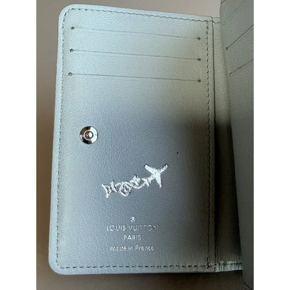 Louis Vuitton Coussin Lou Wallet LV Ski Monogram Embossed Lambskin Grey 72953